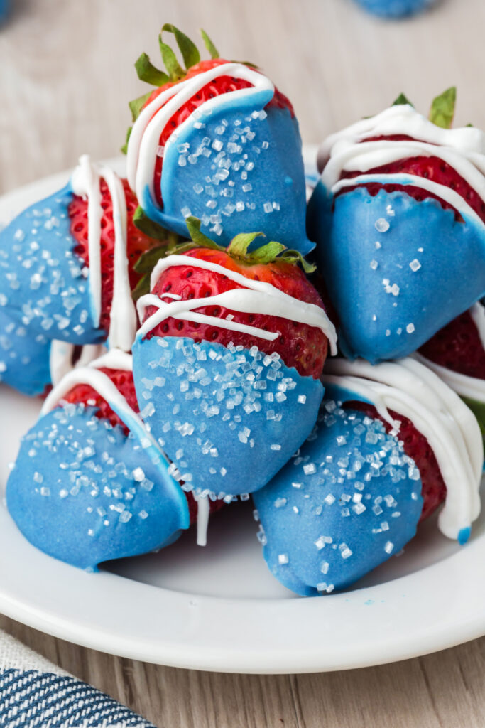 patriotic strawberries piled onto a serving platter